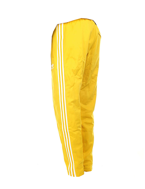 yellow adidas track pants